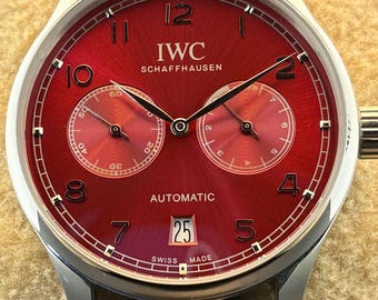 Vintage IWC Schaffhausen 7 Days Power Reserve Automatic Red Dial, Black Rubber Strap, Silver Case Transparent Back, Sub-Sec/Date Wristwatch