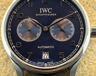 Vintage IWC Schaffhausen 7 Days Power Reserve Automatic Blue Dial, Black Leather Strap, Silver Case Transparent Back Sub-Sec/Date Wristwatch