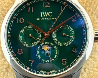 Vintage IWC Schaffhausen Sun Phase Automatic Green Dial, Green Leather Strap, Silver Case Date/Day/Month Working Transparent Back Wristwatch