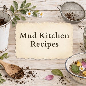 May include: A rectangular card with deckled edges featuring the text Mud Kitchen Recipes in dark brown font. Surrounding the card are a white metal bucket filled with soil, a wooden spoon, a metal sieve, a glass jar, and scattered leaves and petals.