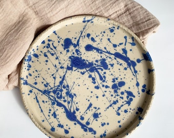 Large hand-thrown pottery plate with blue splatter glaze, serving plate, cake plate, splatter ink presentation plate