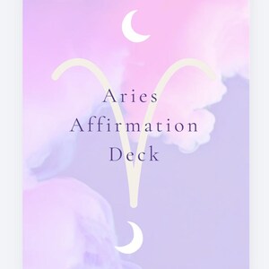 May include: Aries Affirmation Deck card with a soft, dreamy background of pink and purple hues. The card features the word "Aries" in the center, with "Affirmation Deck" below. A crescent moon is at the top and bottom of the card.