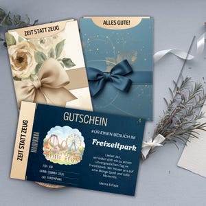 May include: Three gift cards with elegant designs. One features floral art and a bow, another has a blue bow, and the third is a ticket for a theme park. The ticket reads "GUTSCHEIN" and "Freizeitpark".