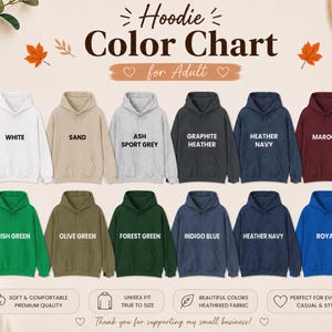 May include: A hoodie color chart for adults displaying twelve hooded sweatshirts in various colors including white, sand, ash sport grey, graphite heather, heather navy, maroon, irish green, olive green, forest green, indigo blue, and royal blue.