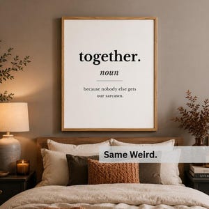 Funny together definition printable displayed above a cozy bedroom bed featuring warm neutral decor, relationship humor typography, and modern minimalist styling.