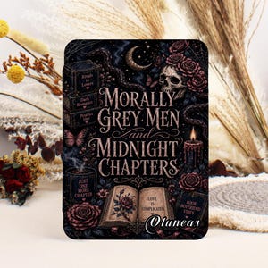 May include: A rectangular print featuring a dark, gothic-inspired illustration with the text "Morally Grey Men and Midnight Chapters." The design includes a skull, roses, a crescent moon, a burning candle, and open books with various book-related phrases.