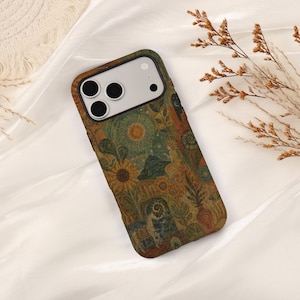 May include: A rectangular smartphone case featuring a detailed, multi-colored illustration with earthy tones of brown, green, and gold. The design includes a sun, sunflowers, foliage, a vase, and a figure, all arranged in a dense, layered pattern.