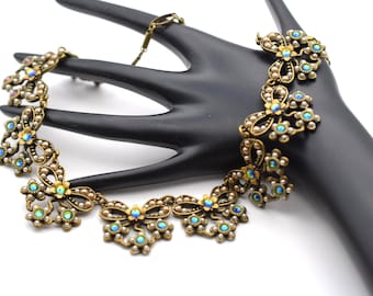 Michal Negrin Bib Necklace, Bronze Metal, Green AB Swarovski Crystals, NEW!