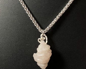 Hand Carved Quartz Periwinkle Pendant on 16” Stainless Steel Chain with 2” Extender.