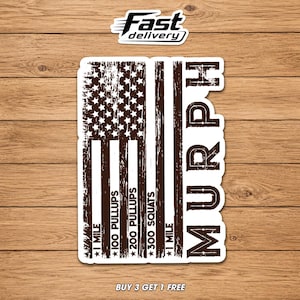 May include: A sticker featuring a distressed American flag design with the word "MURPH" in large letters. The flag design includes text indicating a workout routine: 1 mile run, 100 pullups, 200 pullups, 300 squats, and 1 mile run.