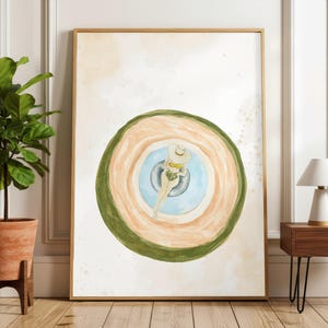 Könnte beinhalten: Aquarelldruck eines Menschen, der in einem Pool schwimmt, von oben gesehen. Das Kunstwerk zeigt konzentrische Kreise in Grün, Beige und Blau, wobei die Figur einen Hut trägt und ein Getränk hält. Der Druck ist gerahmt.
