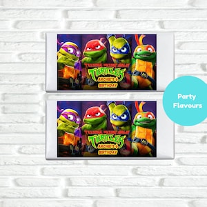 May include: Two rectangular Teenage Mutant Ninja Turtles party favors featuring the four turtles. The favors have a white border and the text "Teenage Mutant Ninja Turtles Archie's Birthday". A turquoise circle with the text "Party Flavours" is on the right.