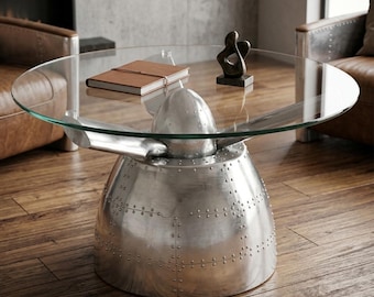 Mesa Aviator | Mesa de centro em alumínio e vidro inspirada em aeronaves | Mobiliário industrial para loft com temática aeronáutica