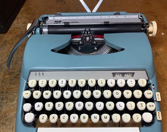 Sky blu and silver Smith-Corona STERLING typewriter