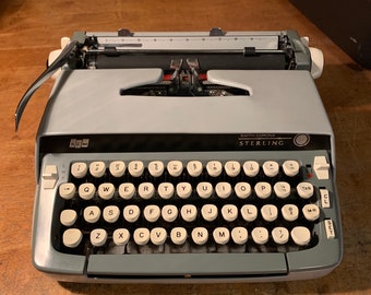 Blue Smith-Corona STERLING typewriter