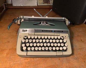 Green Smith-Corona GALXIE DELUXE typewriter