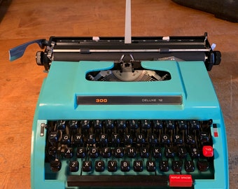 Turquoise KMart 300 DELUXE 12 typewriter