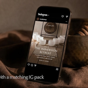 Visual of a phone on linen fabric next to a sound healing bowl and mallet, with retreat invite post on the screen with wording "the immersion retreat".