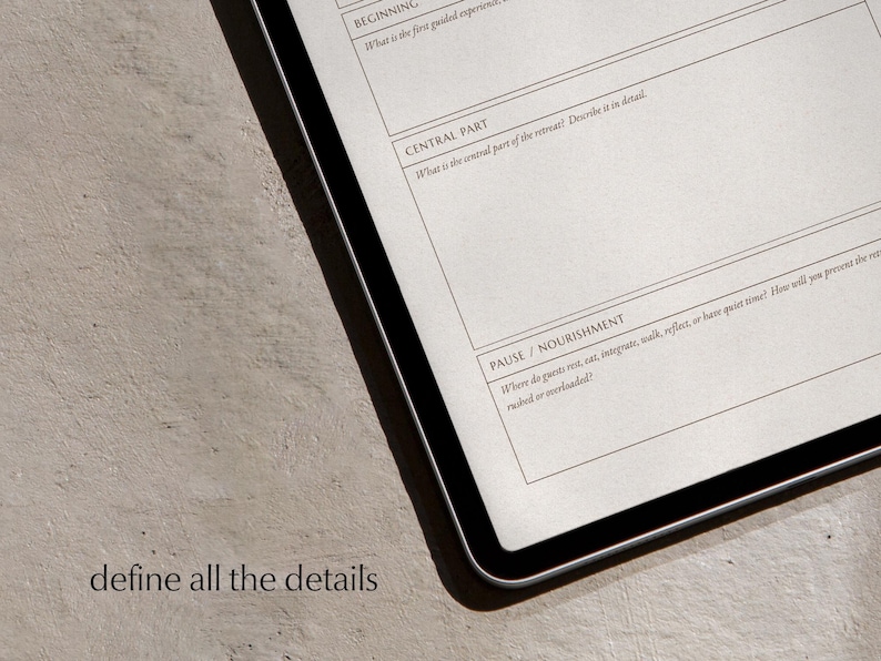 Closeup of Flow map worksheet displayed on tablet laying on beige earthy surface, with text overlay "define all the details".
