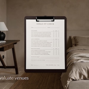 Visual of earthy luxurious retreat accomodation bedroom interior, with Venue evaluation checklist page displayed on a paper holder with metal clamp.