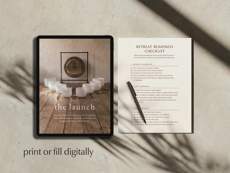 A tablet with Launch section opening page displayed on the screen, with a single printed Retreat Readiness Checklist and a pencil page next to tablet, on beige earthy surface, and text overlay saying "print or fill digitally".