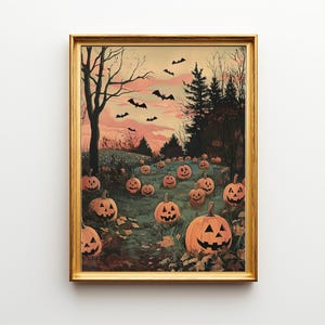 May include: A framed wall art print featuring a pumpkin patch at dusk with orange jack-o'-lanterns, dark silhouettes of trees, and black bats flying across a pale pink and peach sky. The scene depicts numerous carved pumpkins in a grassy field.