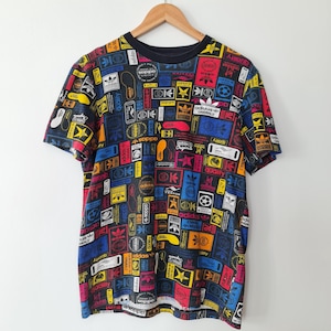Vintage Adidas Originals Graphic T-shirt | Sliten retro-t-shirt | Storlek Small