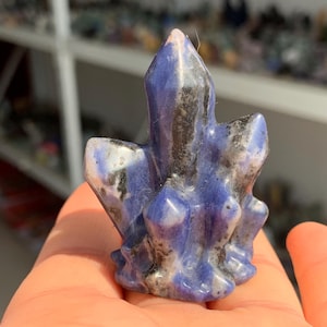 May include: A rustic wooden sign with the text "Welcome to our home" in white lettering. The sign features a distressed finish and a simple, inviting design, perfect for entryway decor.