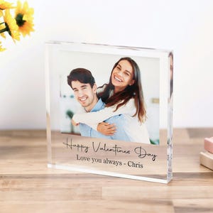 May include: A clear acrylic photo block with a picture of a couple. The text "Happy Valentines Day Love you always - Chris" is printed on the block.