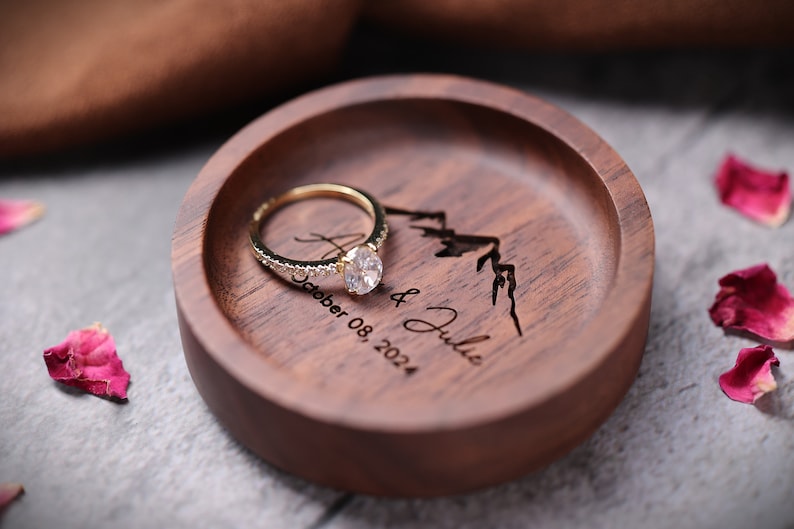 Personalized wooden ring dish with custom engraving, ideal as an engagement ring holder or wedding gift, unique anniversary gift for her.