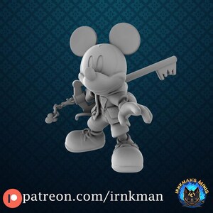 May include: A gray 3D-printed figurine of Mickey Mouse in a dynamic pose, holding a key-shaped weapon. The figure is wearing a vest and shorts. The background is a dark blue pattern. The text "patreon.com/irnkman" is visible at the bottom.