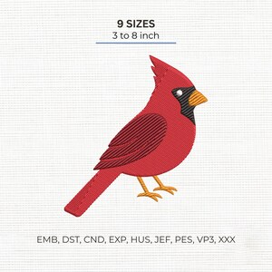 May include: An embroidery design of a red cardinal bird with a black face mask and orange beak. The text reads 9 SIZES 3 to 8 inch and lists file formats EMB, DST, CND, EXP, HUS, JEF, PES, VP3, XXX. The bird has a crest and a long tail.