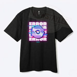 May include: Black t-shirt with a graphic design featuring the word "ERROR" stacked vertically with a glitch effect, and a CD-ROM graphic in the center. The number "404" is below the word "ERROR".