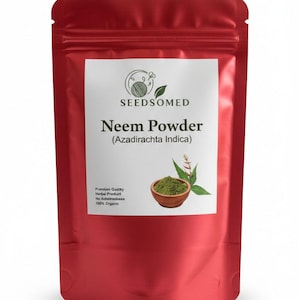 May include: A red pouch of Neem Powder (Azadirachta Indica) with a white label. The label features the brand name SEEDSOMED, product name, and an illustration of a bowl of green powder and leaves. Text on the label states "Premium Quality, Herbal Product, No Additives, 100% Organic."