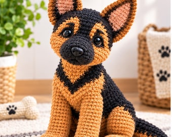 May include: A crocheted German Shepherd dog plush toy featuring a black and tan yarn color scheme, large pointed ears with pink inner details, dark plastic safety eyes, and a black nose, sitting in an upright position with a textured finish.