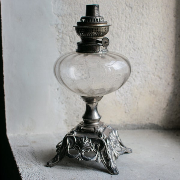 French Oil Lamp with Glass Globe and Cast Metal Base