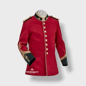 May include: A red military-style tunic featuring a high collar, gold-toned buttons, and dark green cuffs with gold embroidery. The garment includes shoulder epaulets and white piping along the front closure. The text BritishApparel is visible.