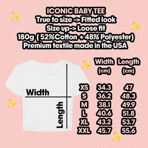 May include: A white t-shirt with a size chart displaying width and length measurements in centimeters for sizes XS through XXL. The text reads: ICONIC BABY TEE, True to size -> Fitted look, Size up -> Loose fit, 180g (52% Cotton + 48% Polyester).