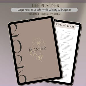 May include: A digital life planner displayed on two tablet screens. The cover features the text 2026, LIFE PLANNER, and Mindset Journal Co with a floral line drawing. The interior page shows a tracking schedule with sections for priorities and tasks.