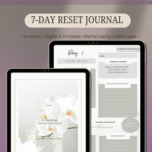 May include: A 7-Day Reset Journal displayed on two digital tablets. The cover features white orchid flowers and the text The 7-Day Soft Reset. The interior page shows Day 2 with sections for morning prompts, daily habits, and evening reflections.