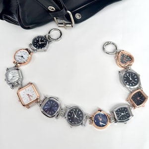 May include: A set of three ceramic mugs with a speckled, matte finish. Each mug is a different colour: light blue, cream, and grey. The mugs have a simple, modern design and a comfortable handle.