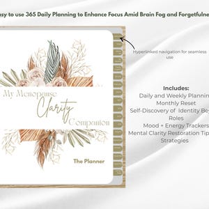 May include: A spiral-bound planner titled "My Menopause Clarity Companion" with floral and botanical illustrations. The cover includes text: "Easy to use 365 Daily Planning to Enhance Focus Amid Brain Fog and Forgetfulness." Features include daily and weekly planning, and mood trackers.