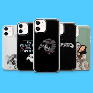 May include: A selection of phone cases with designs inspired by "The Phantom of the Opera." The cases showcase graphics such as the title, a rose, a mask, and character silhouettes. The cases are in various colours, including black, white, and green.