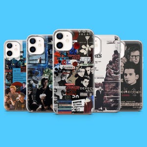 May include: Five clear phone cases with collage designs featuring a band, text, and album art. The cases have black, white, and red elements, with text including "DEPECHE MODE" and "STRANGELOVE". The cases are for a mobile phone.
