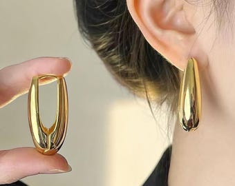 Chunky ovale ringoorbellen: moderne gedurfde drop-sieraden, elegant zilvergoud