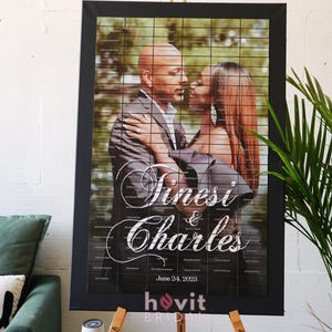 May include: A framed wedding photo featuring a couple embracing, with the names "Tinesi & Charles" in elegant script. The date "June 24, 2023" is also displayed. The photo is set against a grid background.