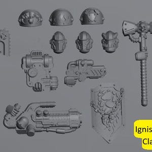 Puede incluir: Colección de componentes grises impresos en 3D para juegos de guerra en miniatura. El conjunto incluye cascos, armas y un escudo. El texto "Ignisaurus Clan Bits" está en un rectángulo amarillo.
