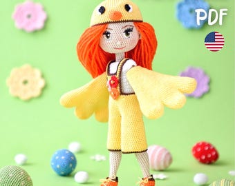 May include: A handmade crochet doll dressed as a chick, wearing a yellow jumpsuit, wings, and a matching hat. The doll has orange hair and orange shoes. The background is light green with crochet flowers and eggs. Text on the image reads "PATTERN PDF".