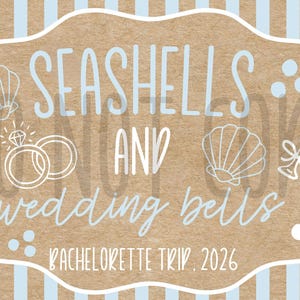 May include: A light brown and blue striped background with a white-bordered, brown oval shape. The oval contains the words "Seashells and Wedding Bells" and "Bachelorette Trip. 2026" in light blue script. Illustrations of seashells, rings, and champagne glasses are also present.