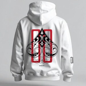 May include: White hoodie with a black and red spade design on the back. The spade design is detailed with intricate patterns and outlined in black. The hoodie also features the text "DOUBLEOH" at the bottom.